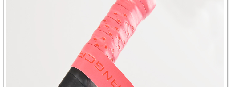 Finished gradient overgrip wrapped on a badminton handle