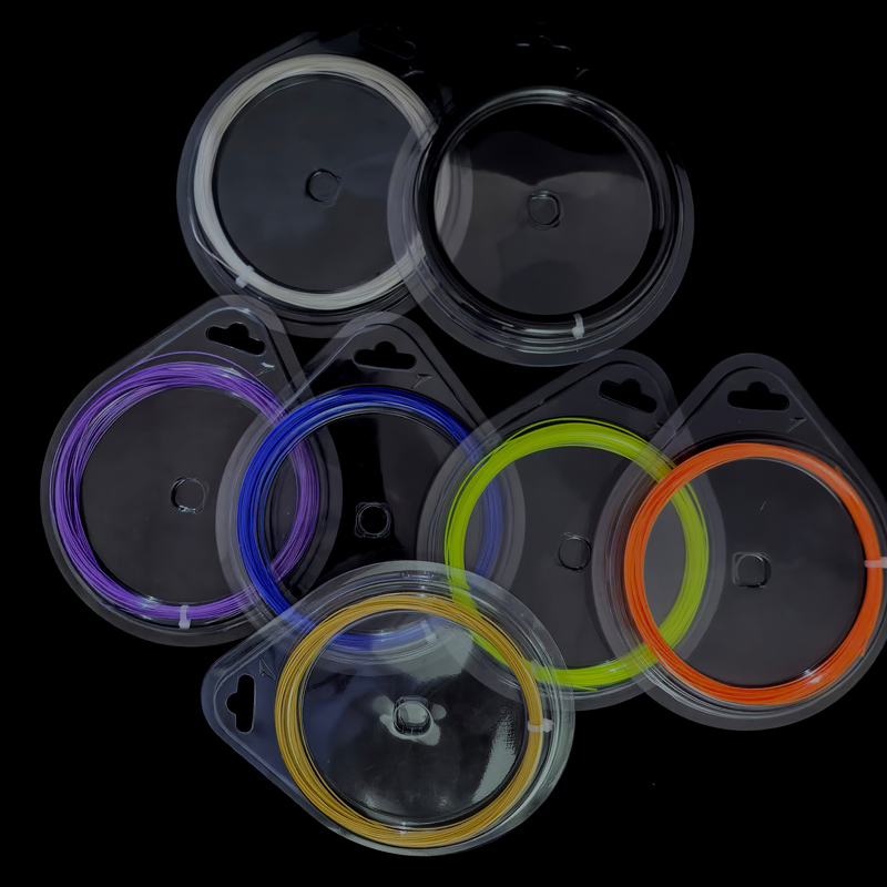 Reels of badminton string in several colours