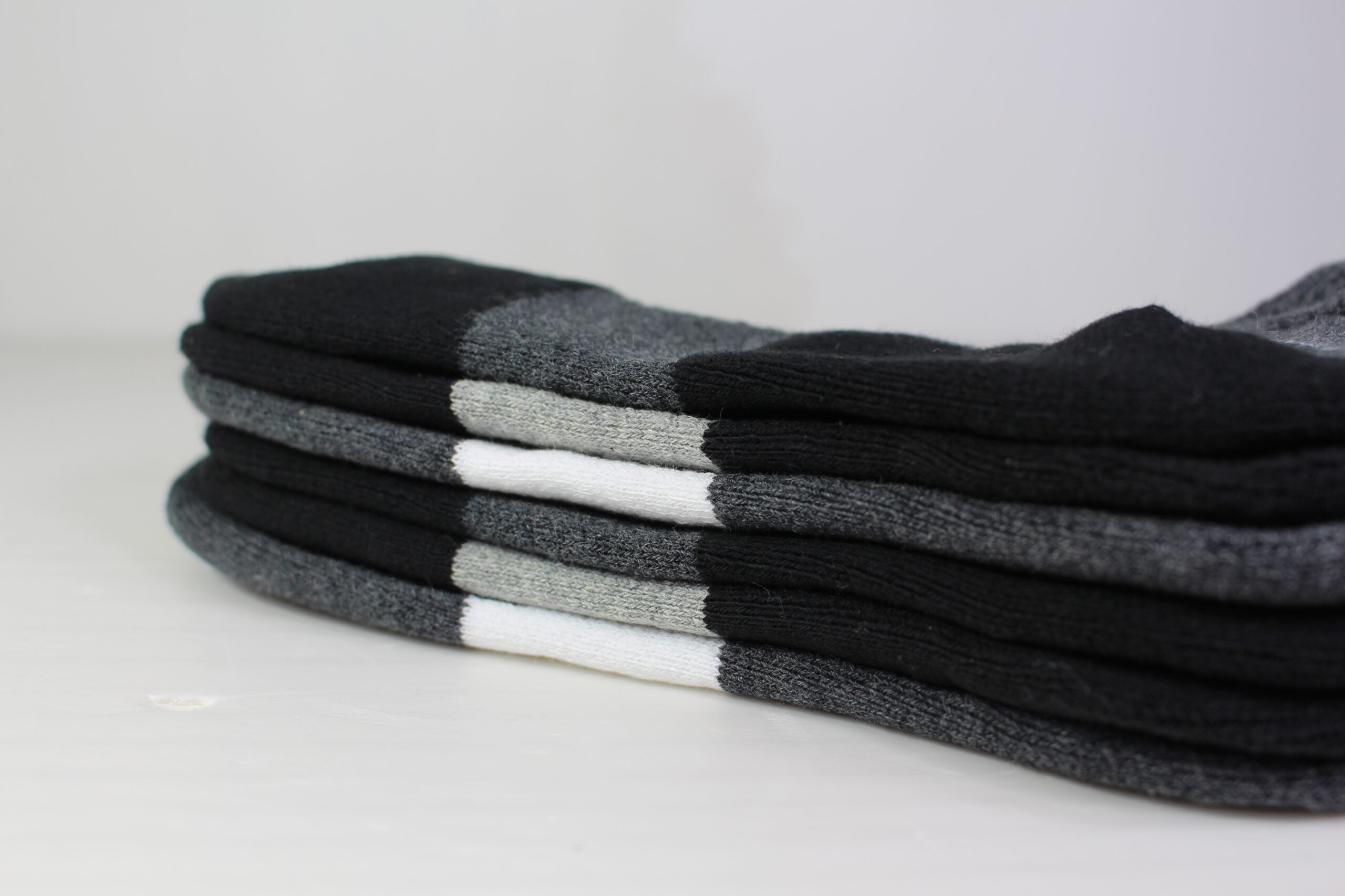 Stacked badminton socks showing heel cushioning and ribbed cuff